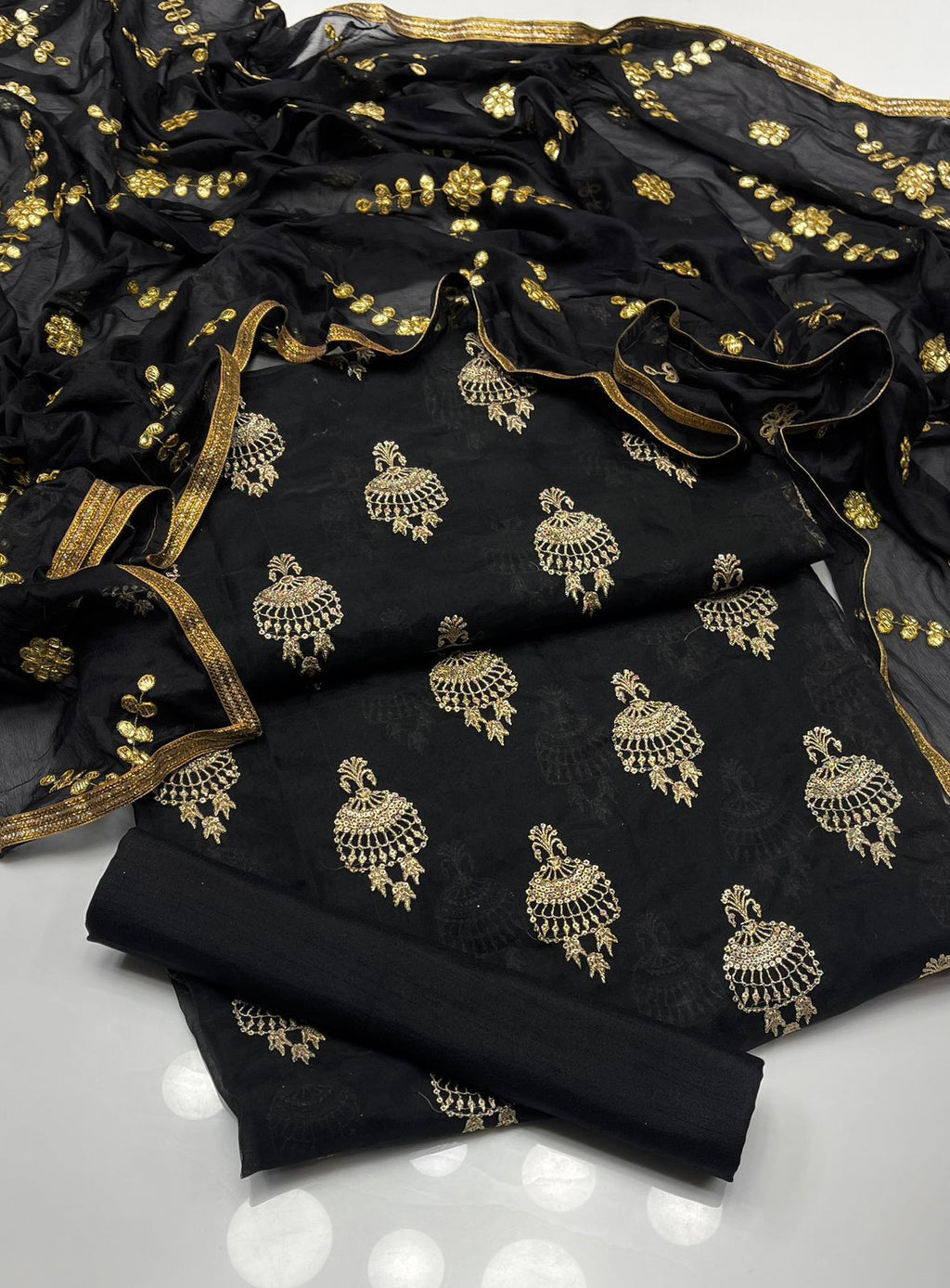 3pc dress fancy  Shirt organza embroidered with sequence work  Dupatta gotta silk  Trouser Kathan